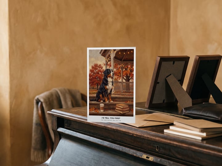 The "The Town Square" card — on a piano beside small framed photos