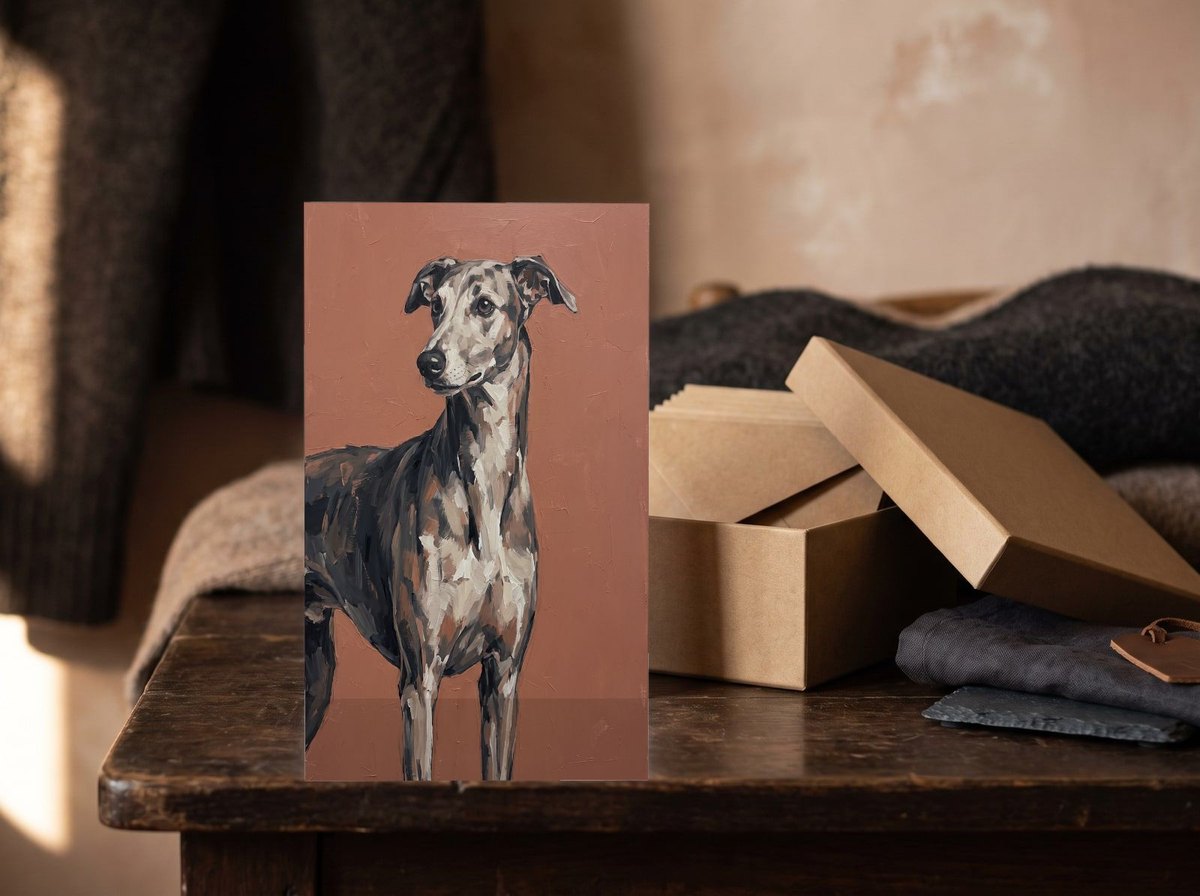 A card standing upright — in front of an open kraft box of envelopes