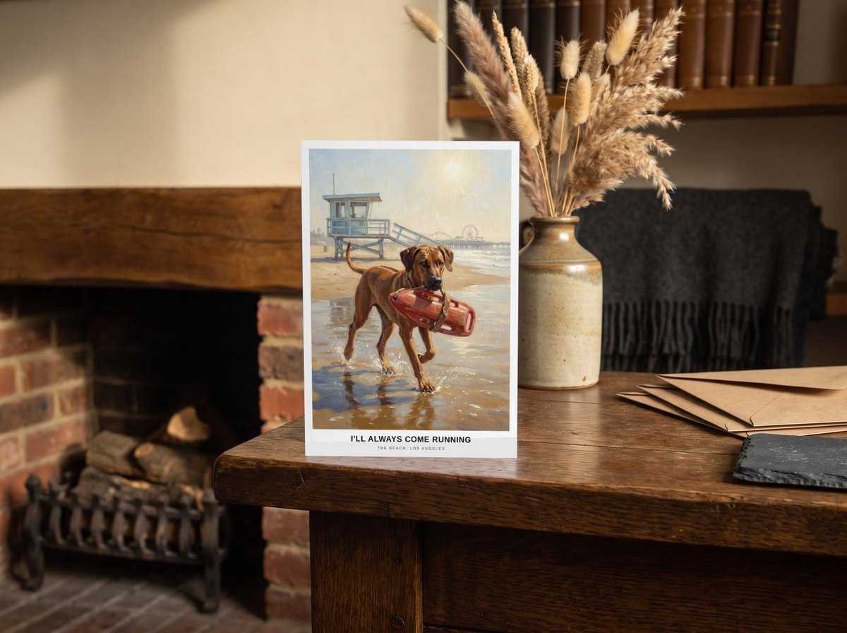 A card standing upright — on an oak mantel beside a vase of dried grasses