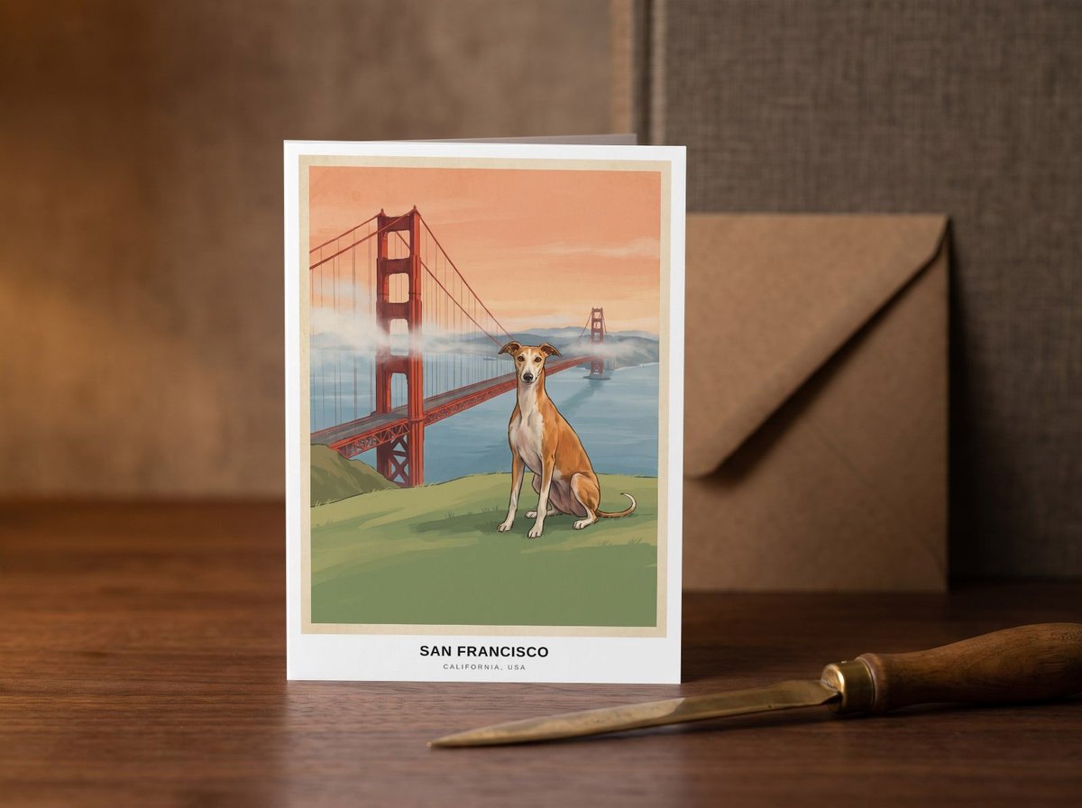 A card standing upright — on a walnut desk with one envelope leaning behind it